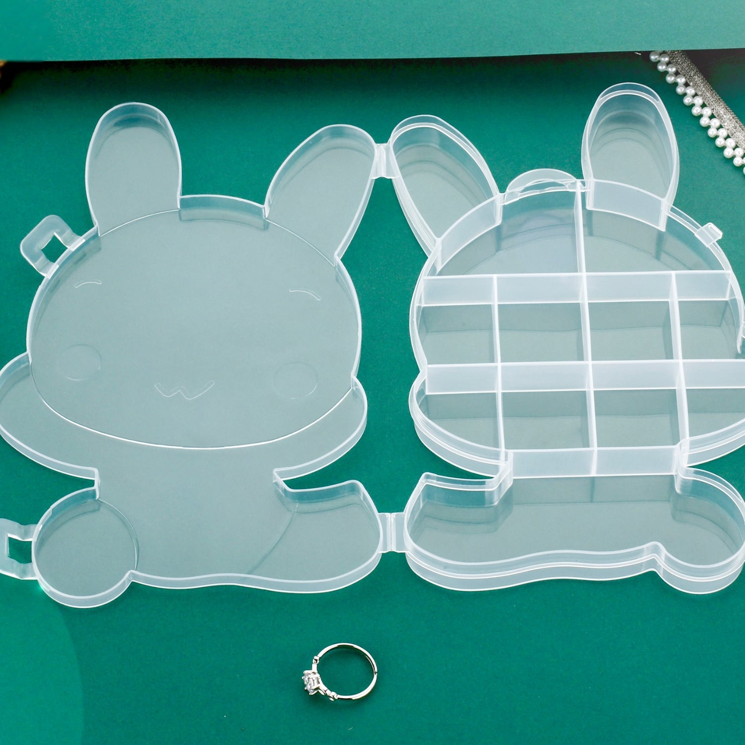 Bear-themed clear plastic organizer for small items. Bear-themed clear plastic organizer for small items.